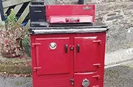 red aga ready to be installed